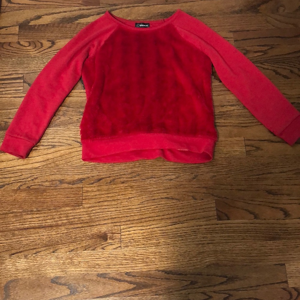 Red fluffy long sleeve shirt. Used.